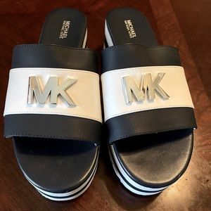 Michael Kors blue and white slides size 7 1/2. Great condition.